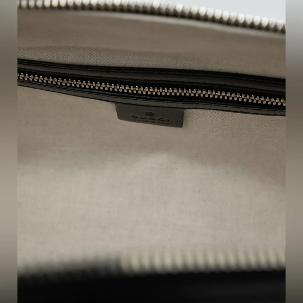 New! Gucci GG embossed black leather duffel bag